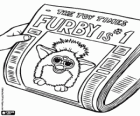 Furby na titulní straně novin, nejprodávanější hračka