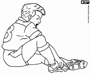 Omalovánka Zraněný fotbalista